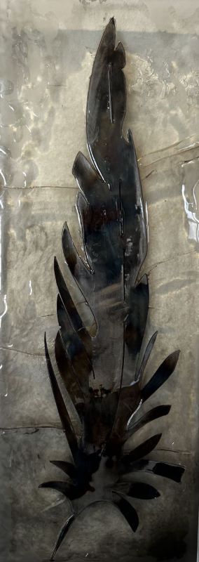 resign epoxy enclosed metal feather