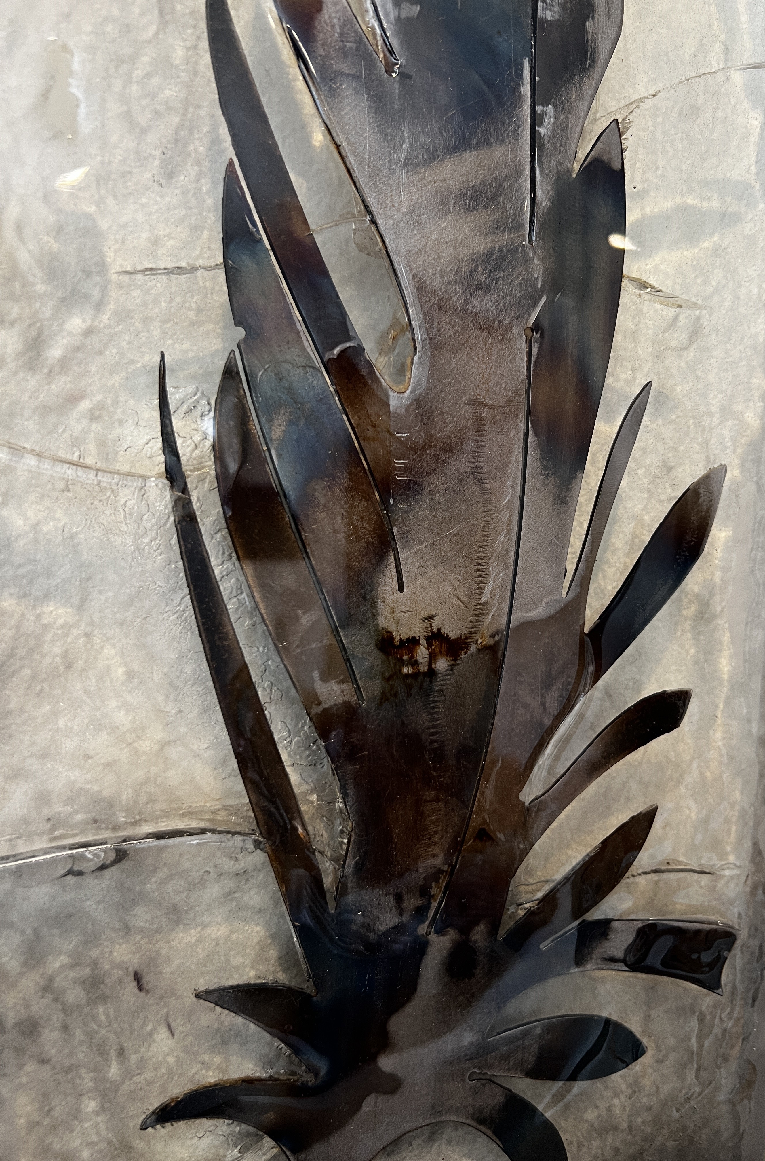 Epoxy-metal feather wall decor